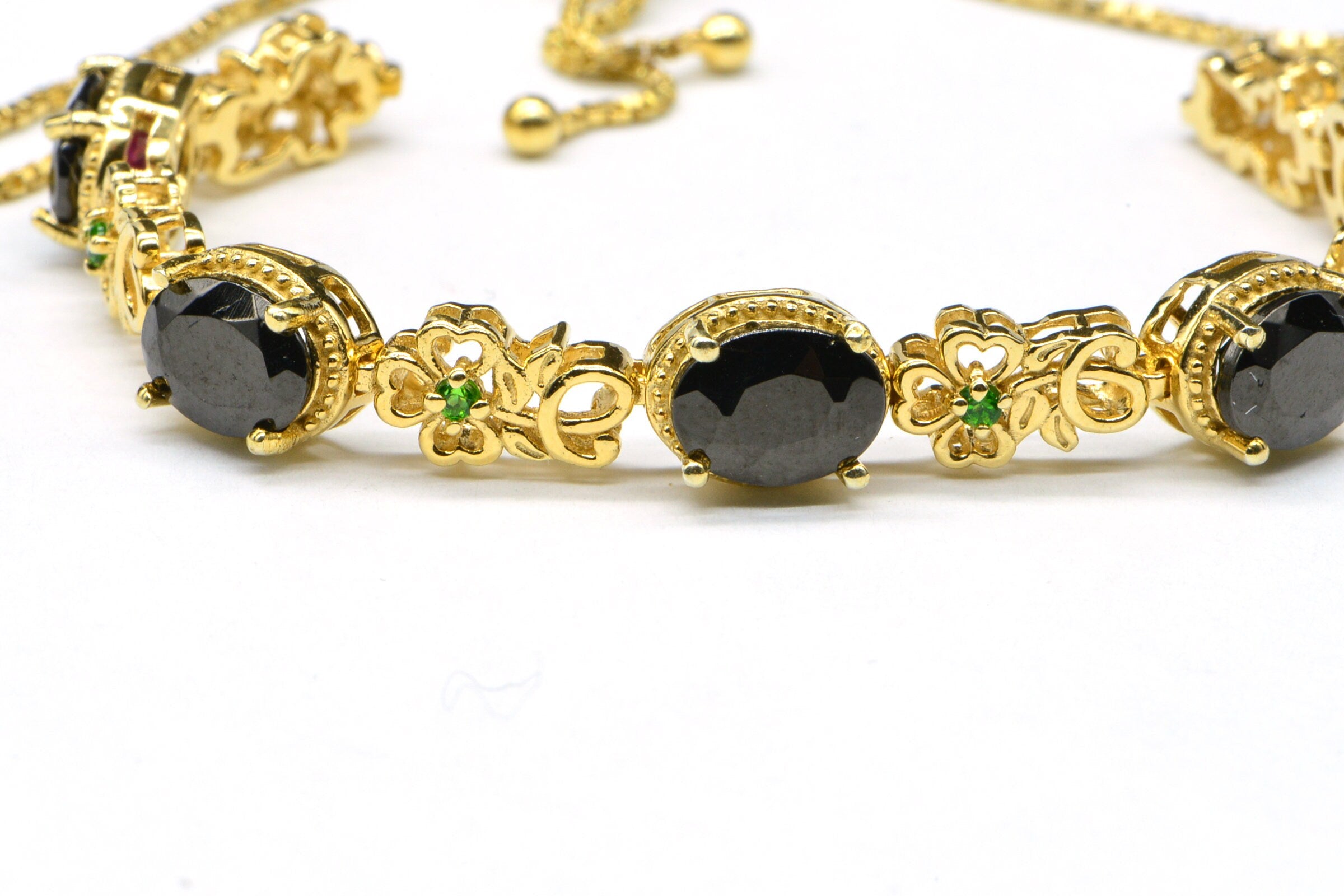 Black Spinel Tennis Bracelet: 14K Gold Over Sterling Silver Bolo Bracelet
