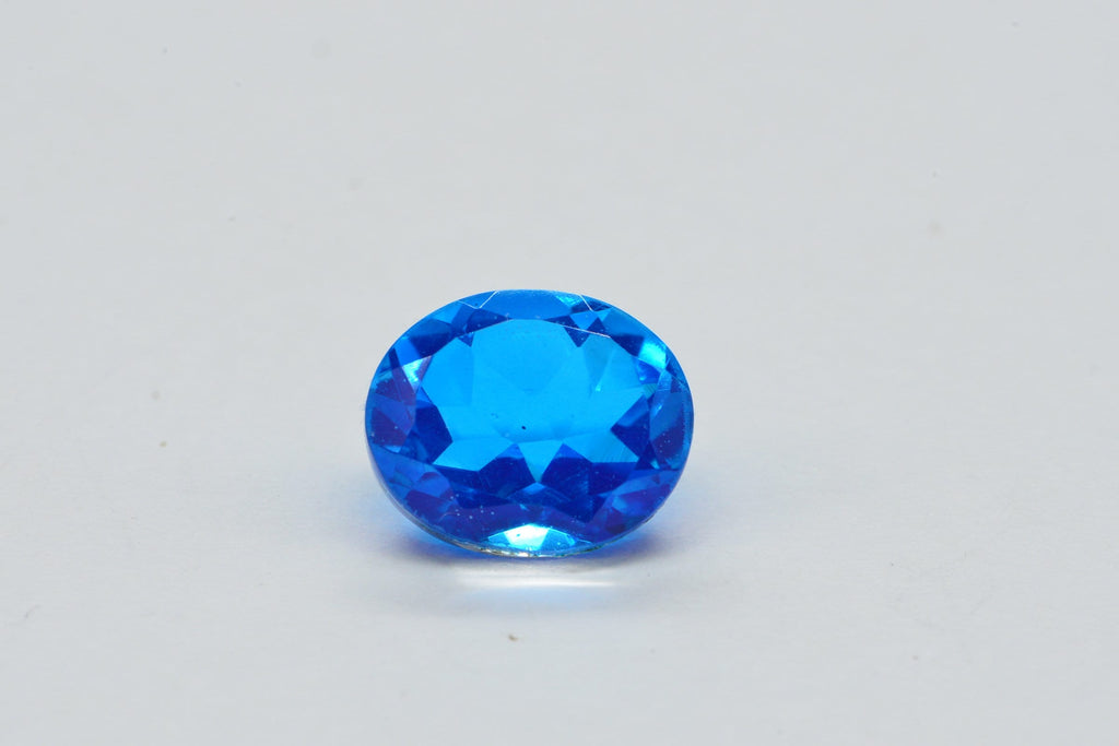 Neon Blue Topaz Doublet Quartz Oval Facet Cabochon