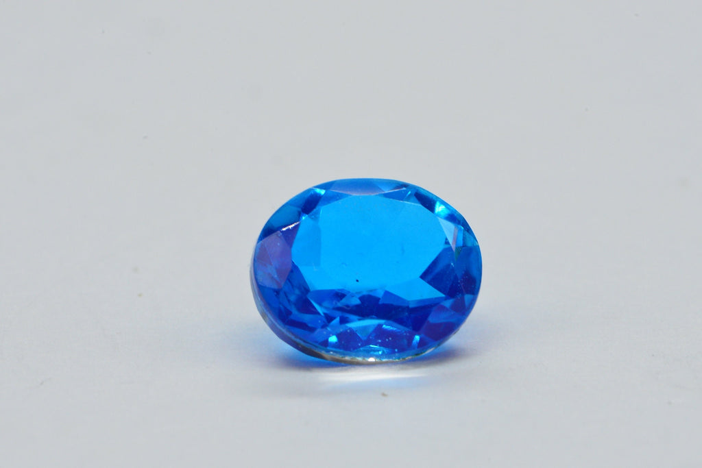 Neon Blue Topaz Doublet Quartz Oval Facet Cabochon