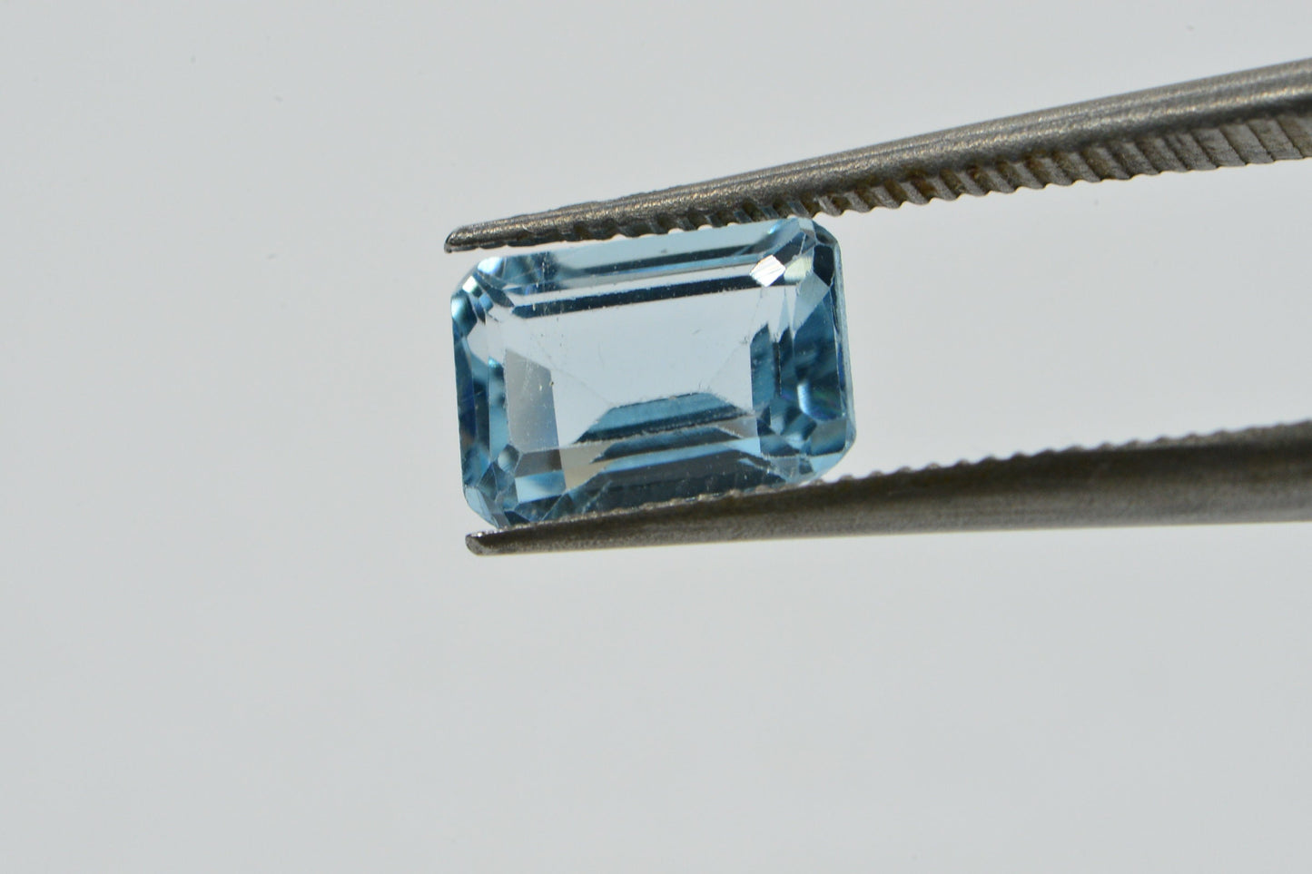 Aqua Blue Topaz Ring: Emerald Cut Crystal Cabochon