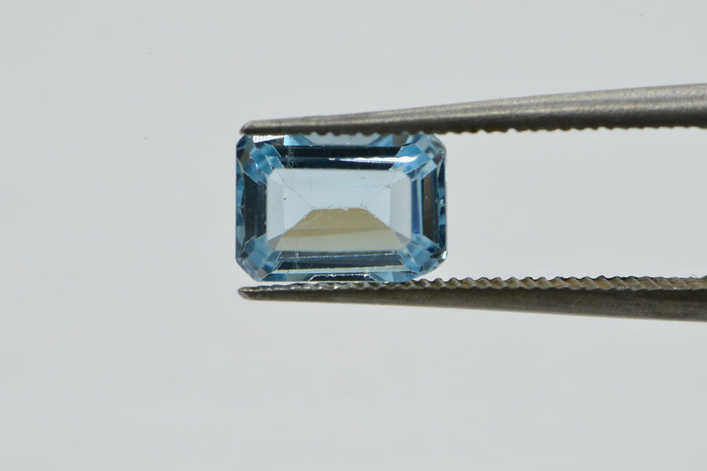 Aqua Blue Topaz Ring: Emerald Cut Crystal Cabochon