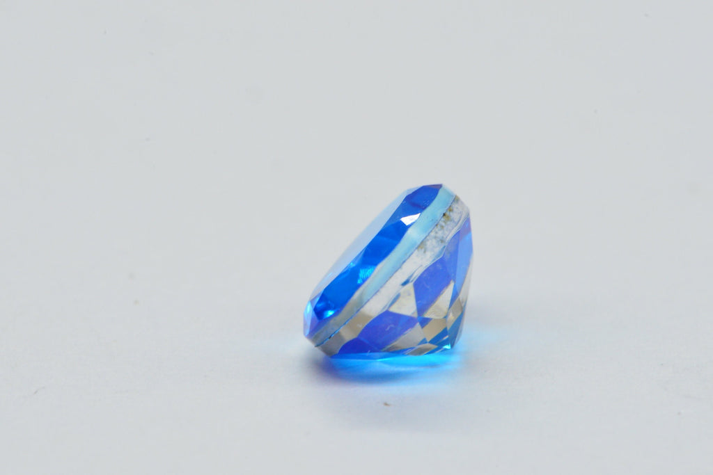 Neon Blue Topaz Doublet Quartz Oval Facet Cabochon