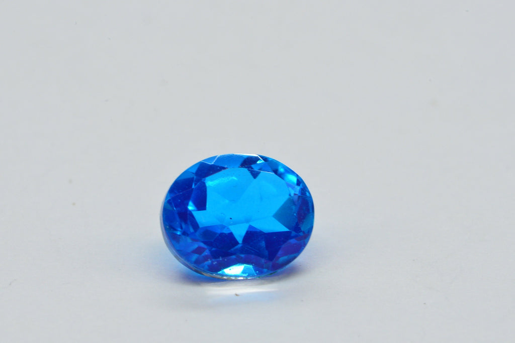 Neon Blue Topaz Doublet Quartz Oval Facet Cabochon