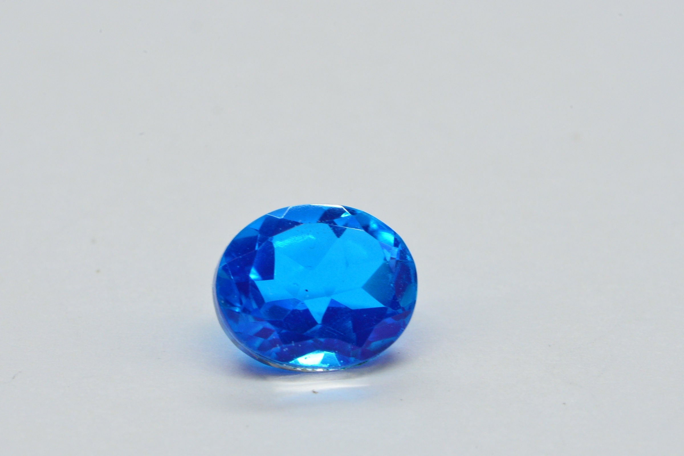 Neon Blue Topaz Doublet Quartz Oval Facet Cabochon
