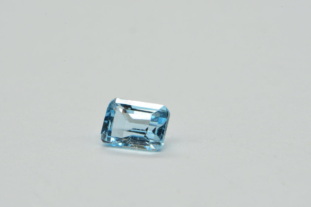Aqua Blue Topaz Ring: Emerald Cut Crystal Cabochon