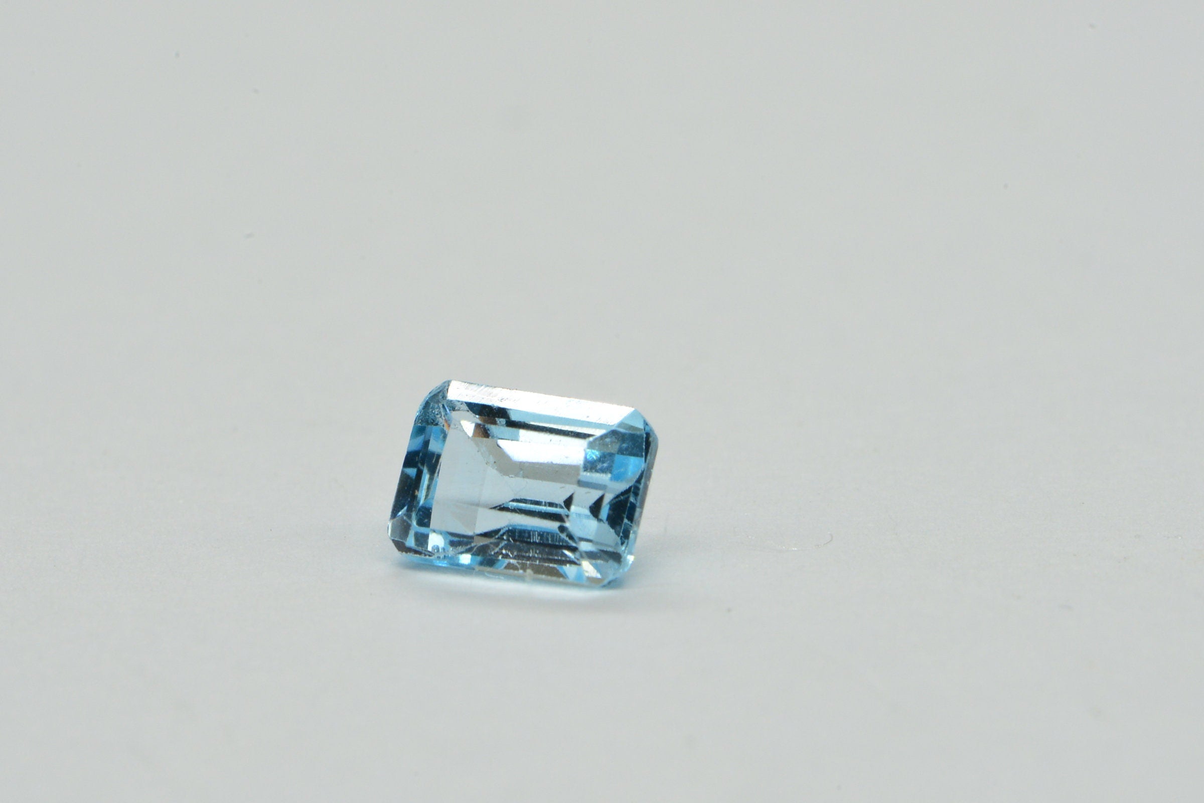 Aqua Blue Topaz Ring: Emerald Cut Crystal Cabochon