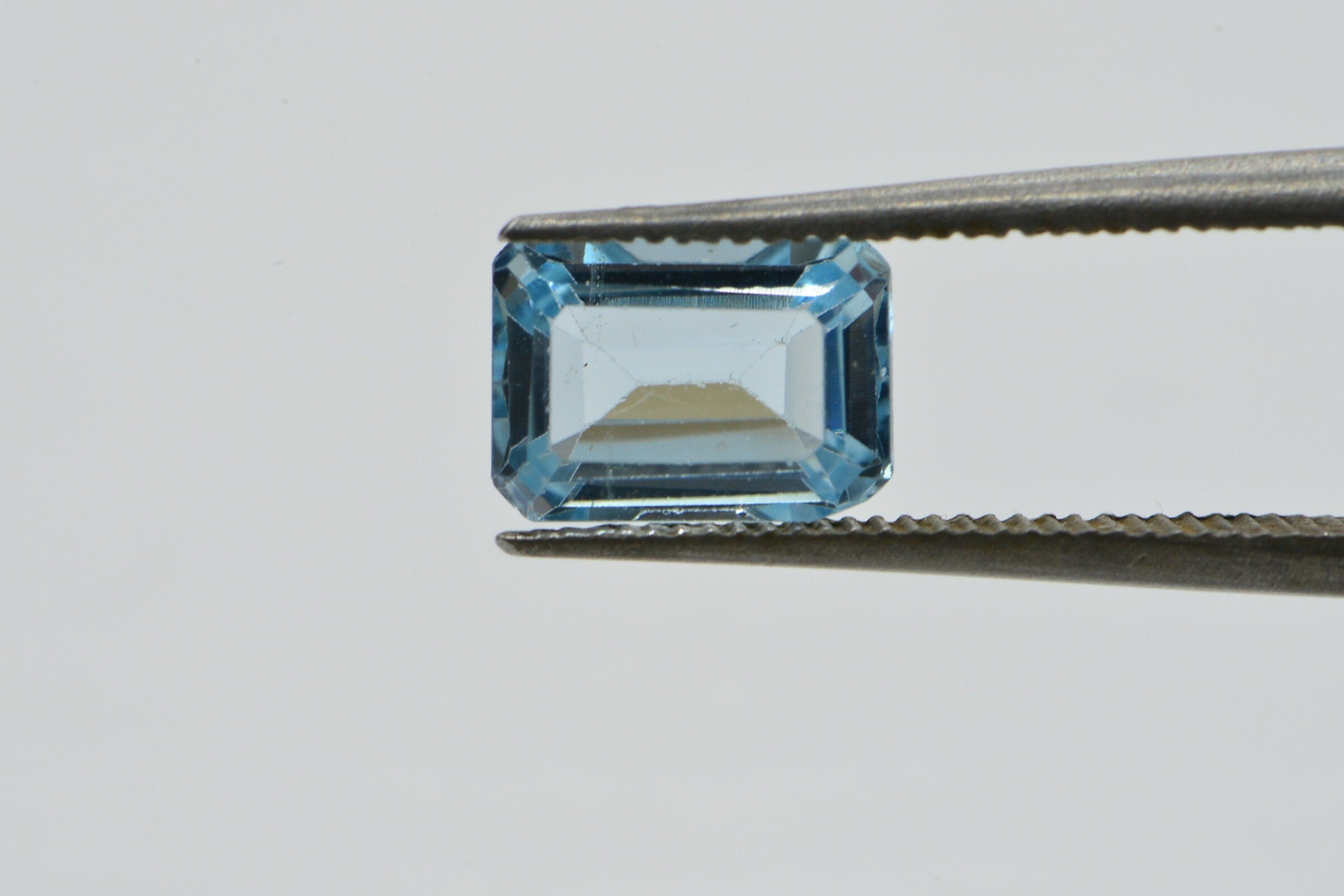 Aqua Blue Topaz Ring: Emerald Cut Crystal Cabochon