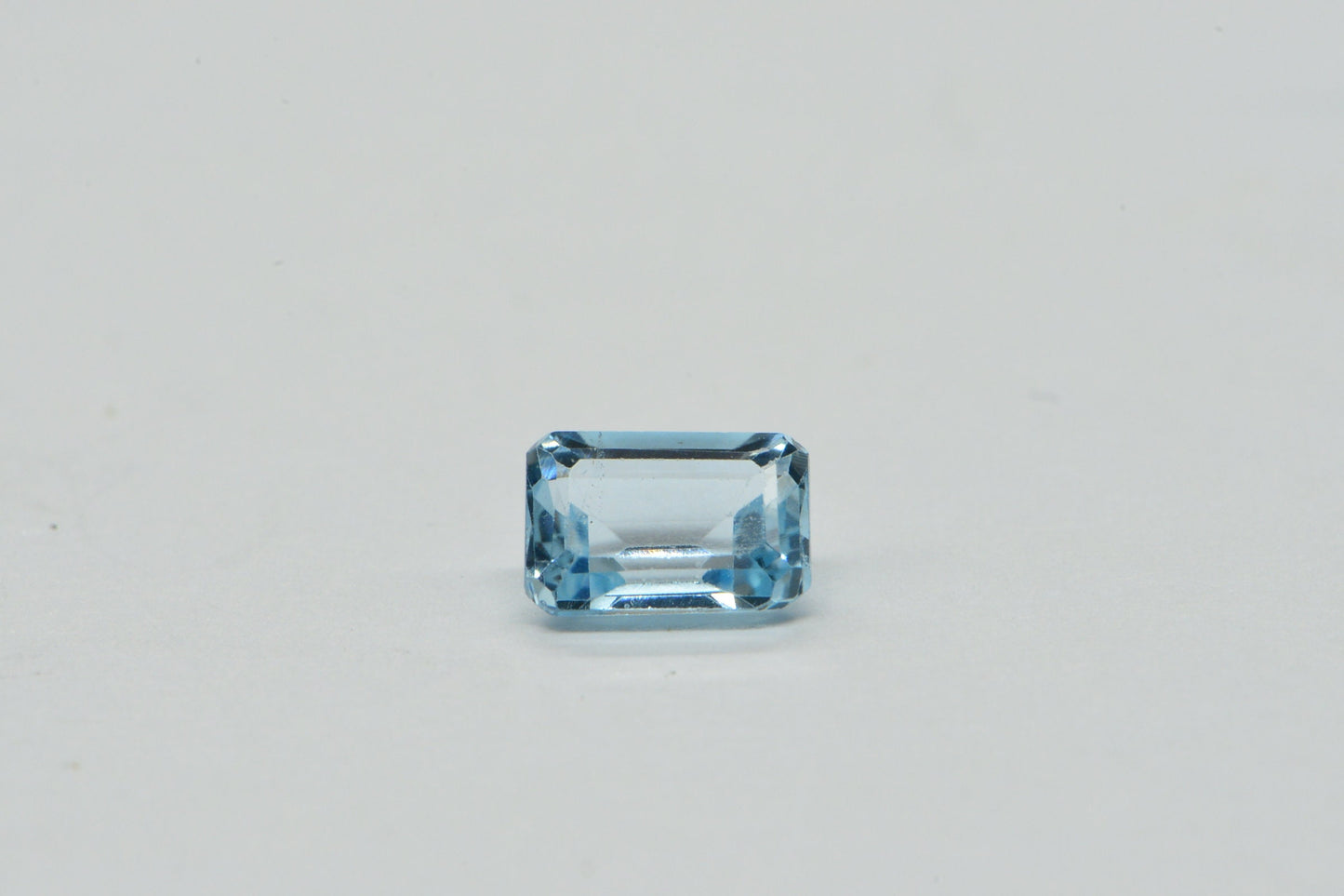Aqua Blue Topaz Ring: Emerald Cut Crystal Cabochon