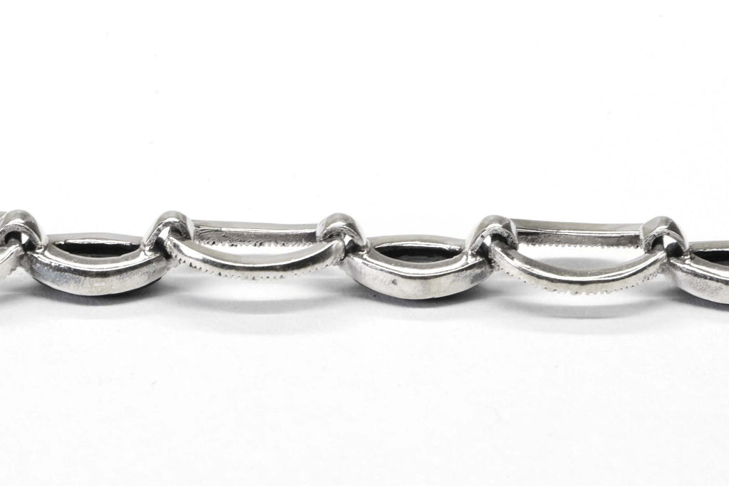 Black Onyx Oval Link Bezel Setting In Sterling Silver Bracelet
