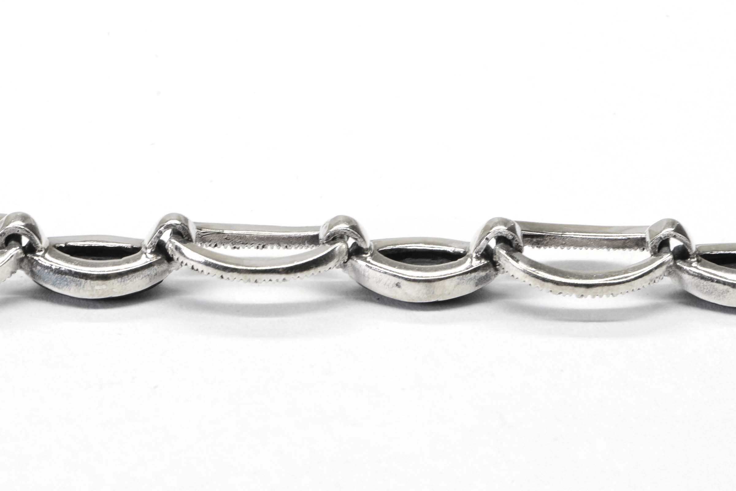 Black Onyx Oval Link Bezel Setting In Sterling Silver Bracelet