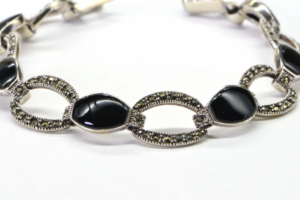 Black Onyx Oval Link Bezel Setting In Sterling Silver Bracelet