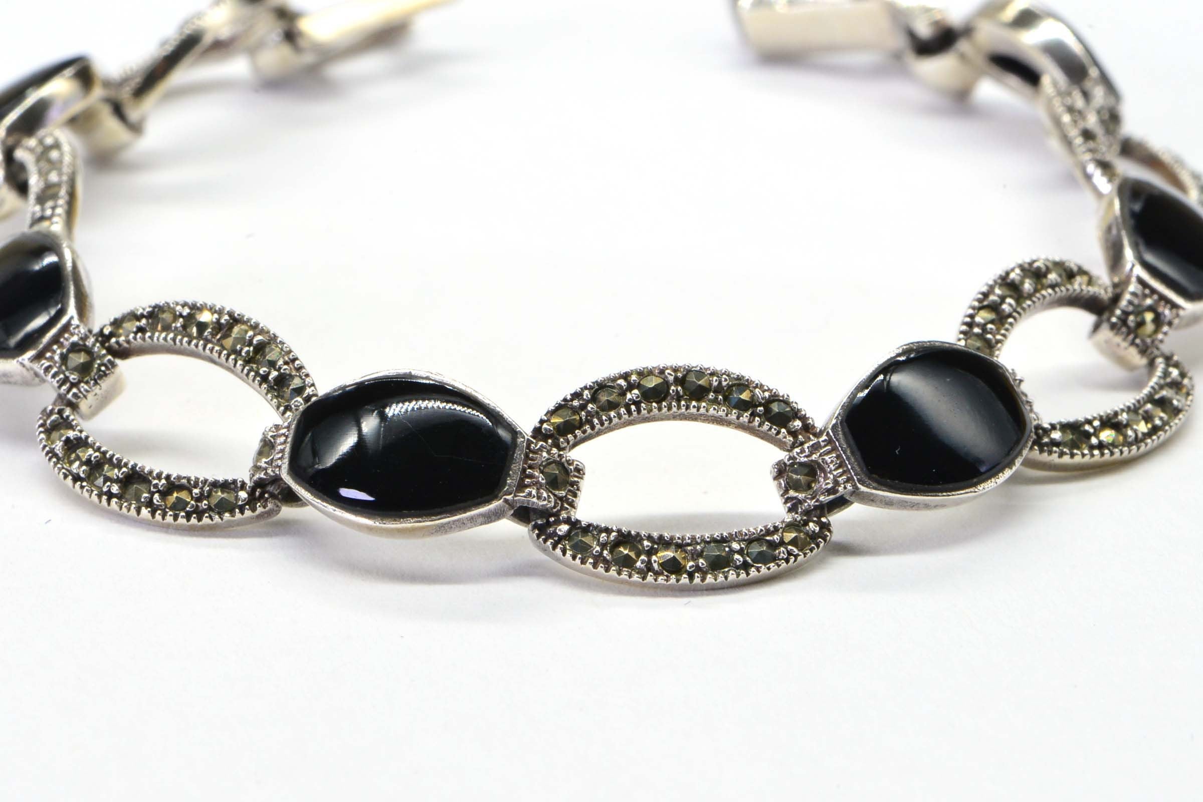 Black Onyx Oval Link Bezel Setting In Sterling Silver Bracelet
