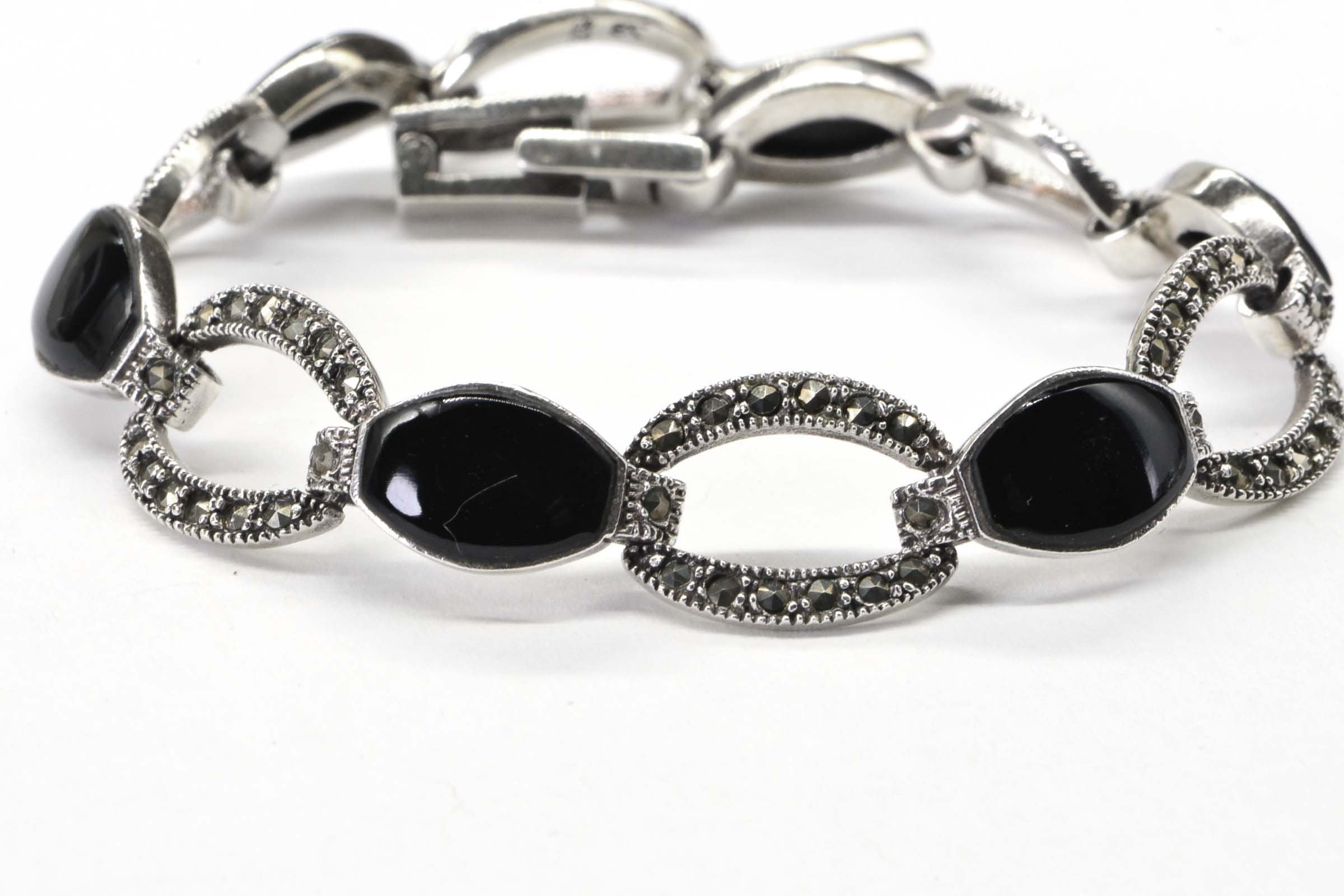 Black Onyx Oval Link Bezel Setting In Sterling Silver Bracelet