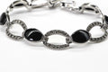 Black Onyx Oval Link Bezel Setting In Sterling Silver Bracelet