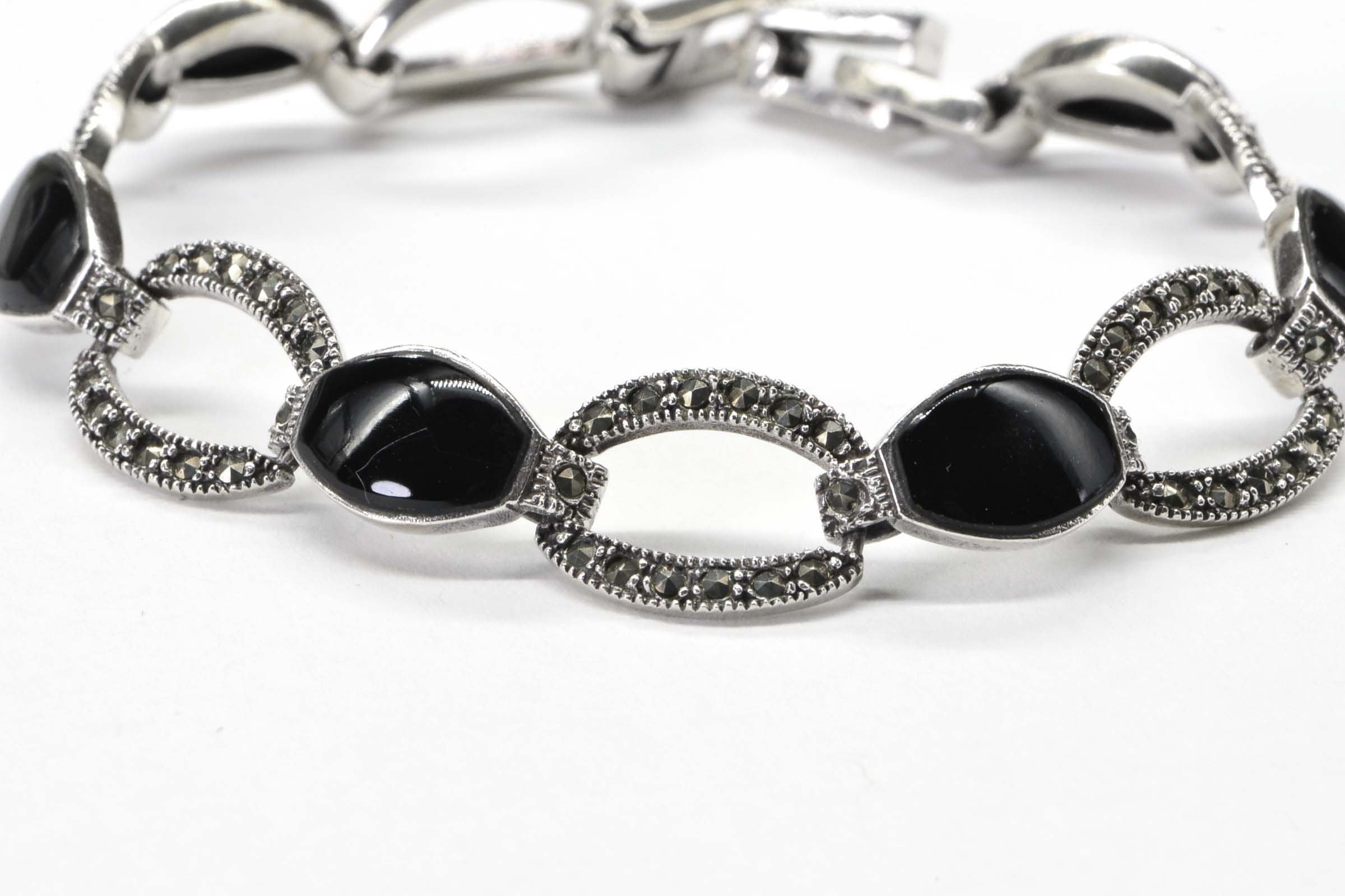 Black Onyx Oval Link Bezel Setting In Sterling Silver Bracelet