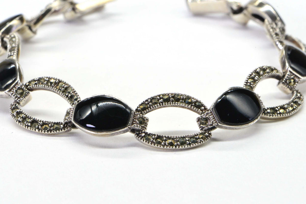 Black Onyx Oval Link Bezel Setting In Sterling Silver Bracelet