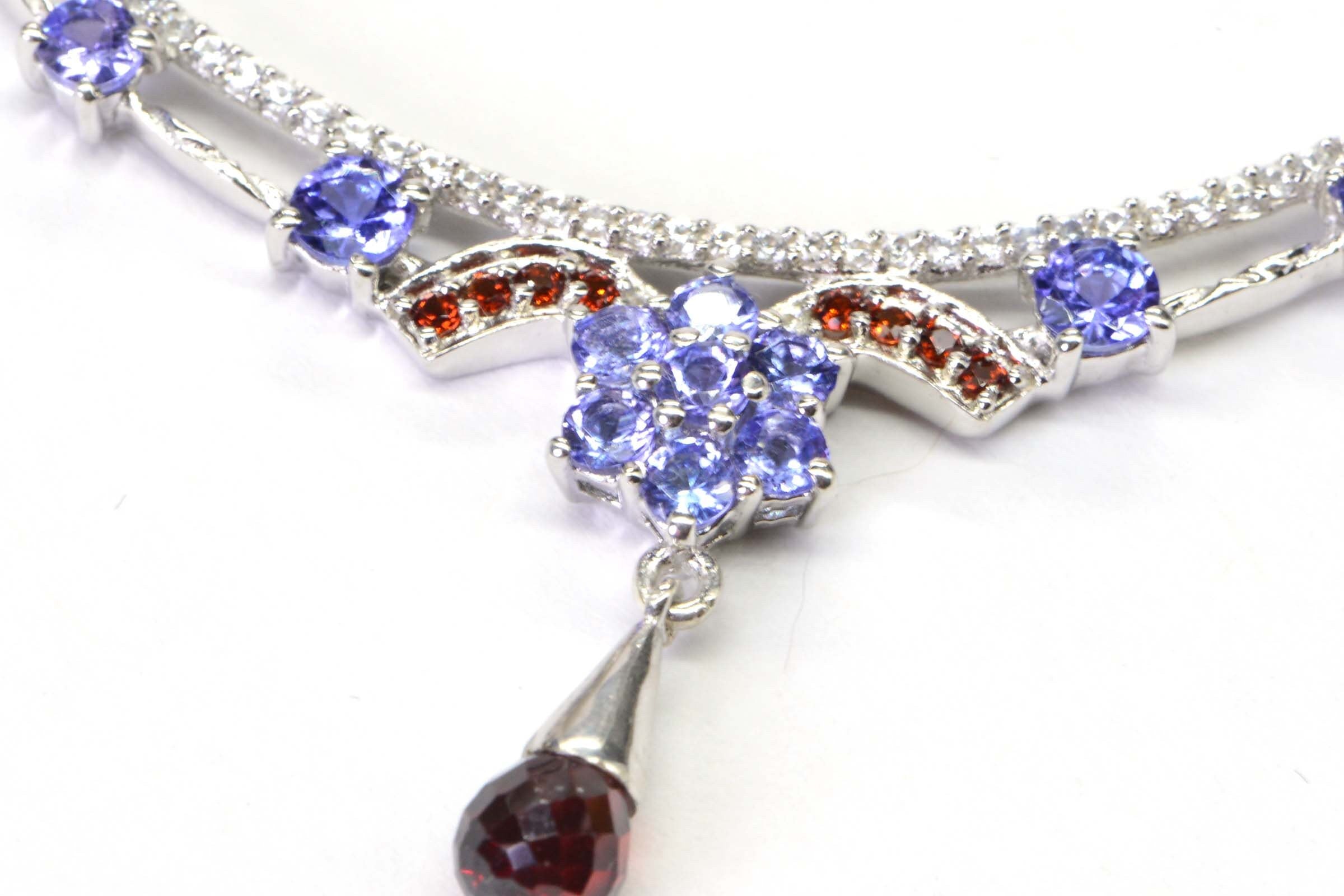 Tanzanite Garnet Sterling Silver Crescent Necklace: CZ Accent