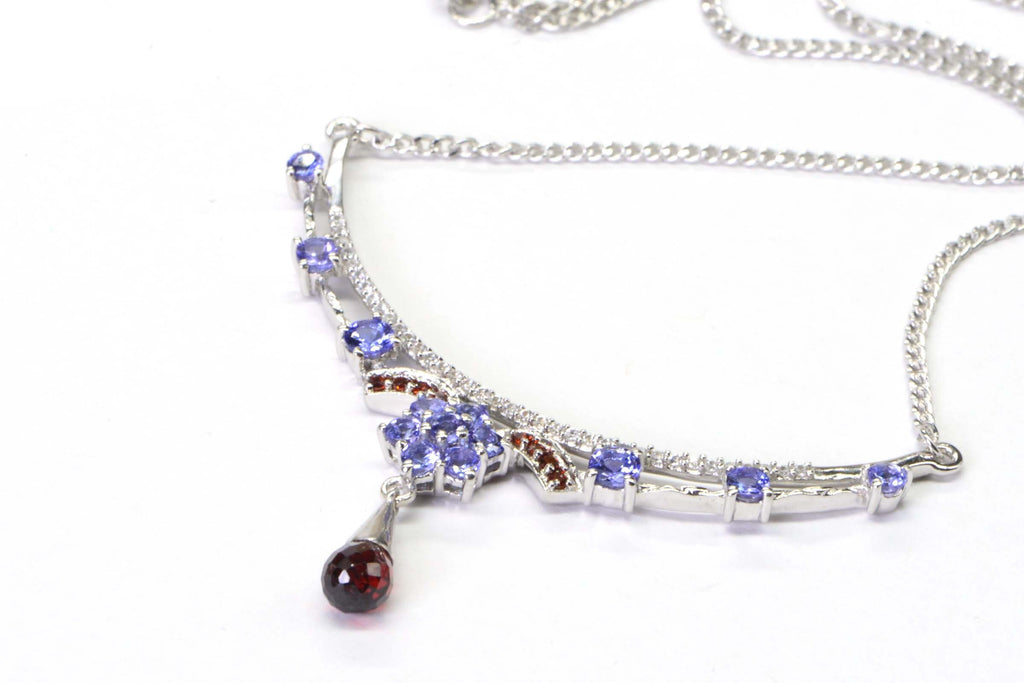 Tanzanite Garnet Sterling Silver Crescent Necklace: CZ Accent