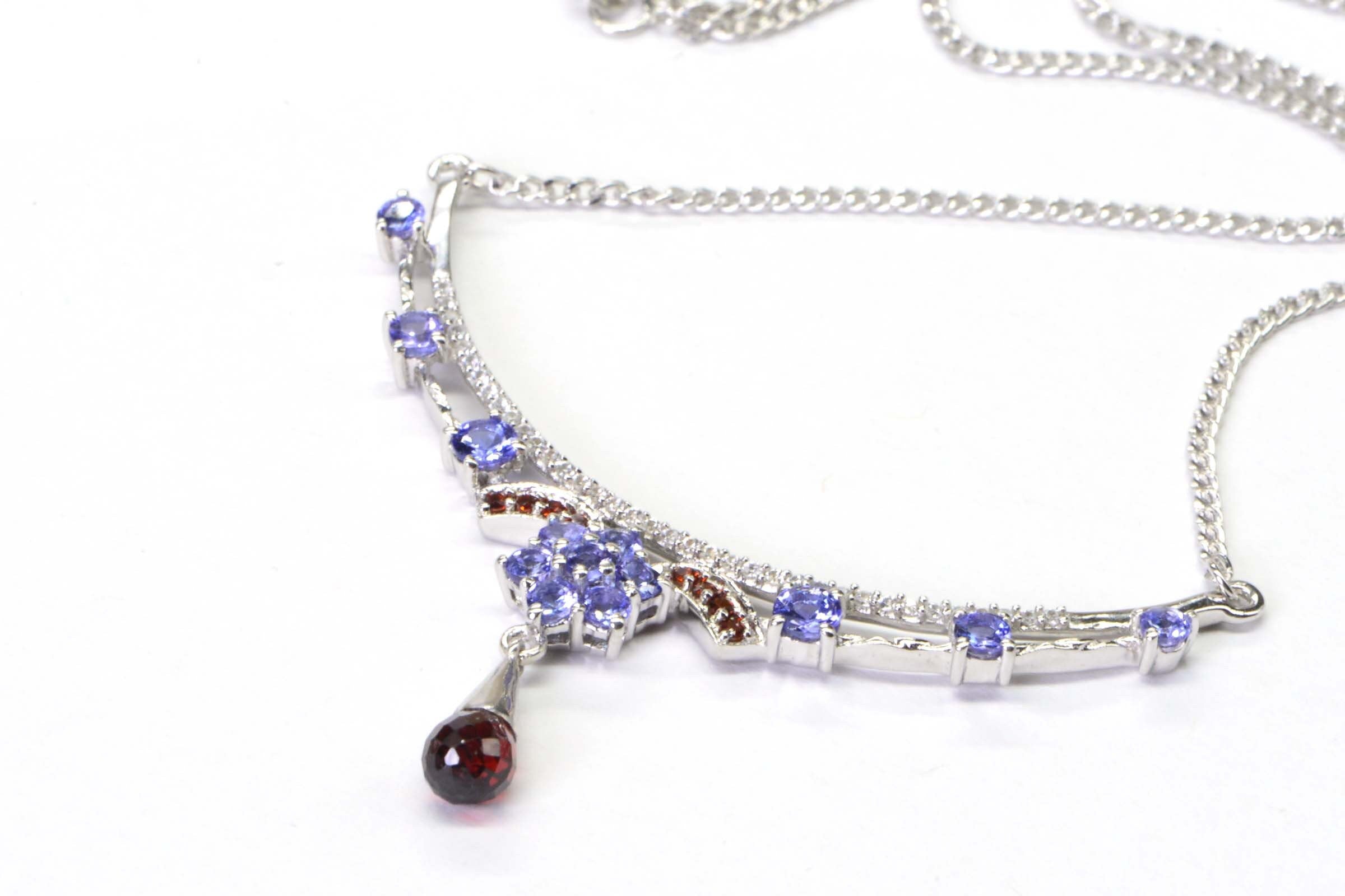 Tanzanite Garnet Sterling Silver Crescent Necklace: CZ Accent