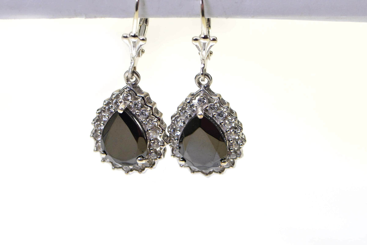 Black Spinel Teardrop Earrings: Sterling Silver Halo Design