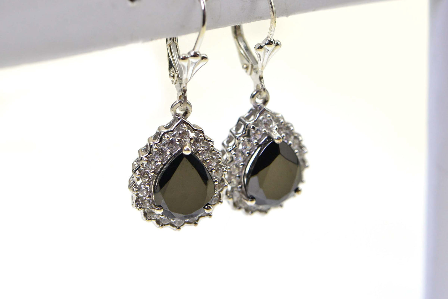 Black Spinel Teardrop Earrings: Sterling Silver Halo Design