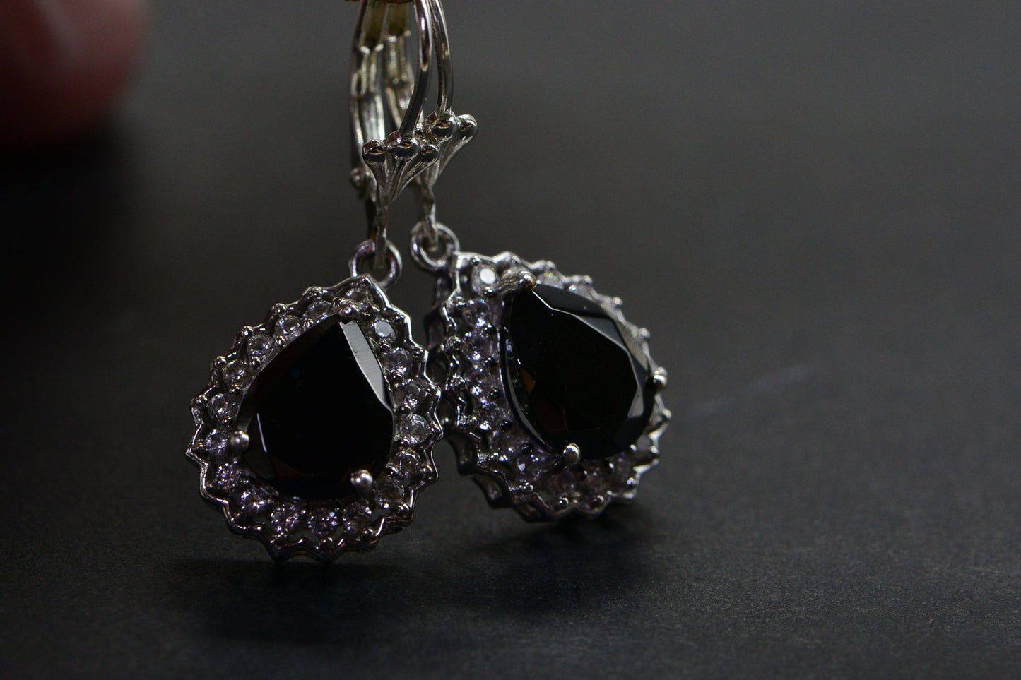 Black Spinel Teardrop Earrings: Sterling Silver Halo Design