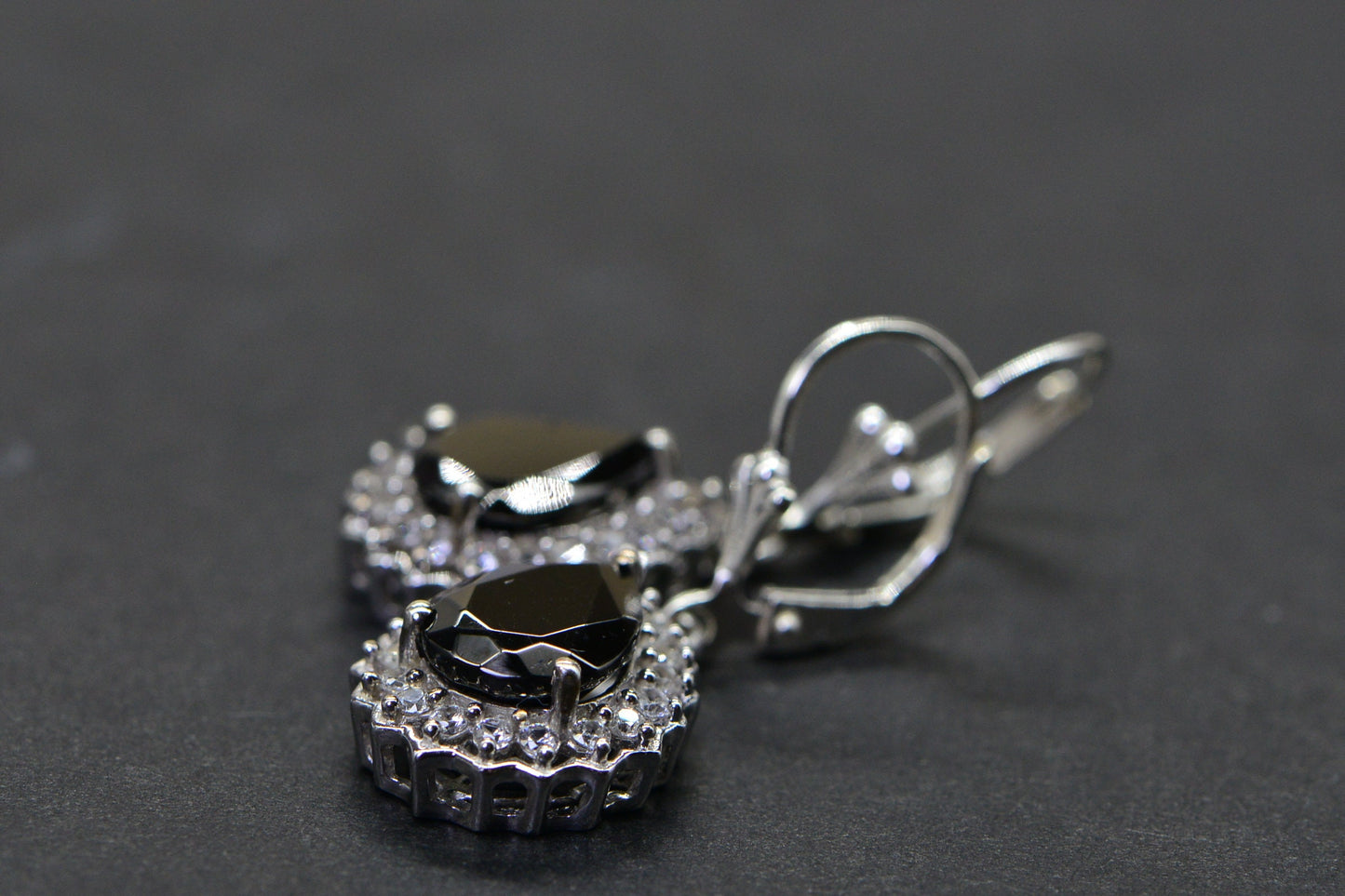 Black Spinel Teardrop Earrings: Sterling Silver Halo Design