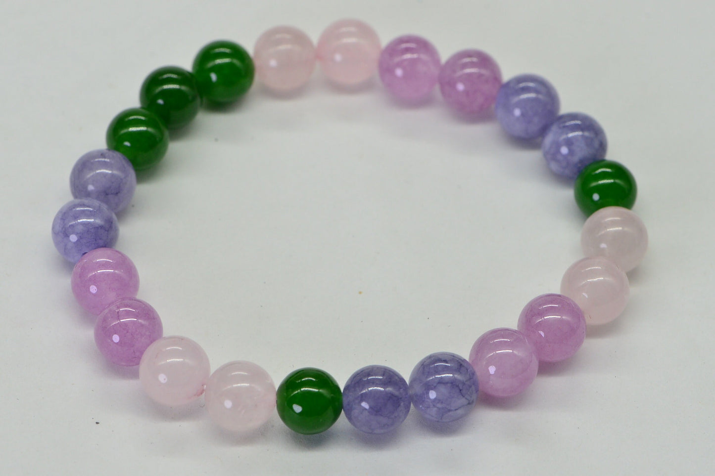 Rose Quartz Beaded Bracelet: Kunzite, Tanzanite & Jade Gemstones