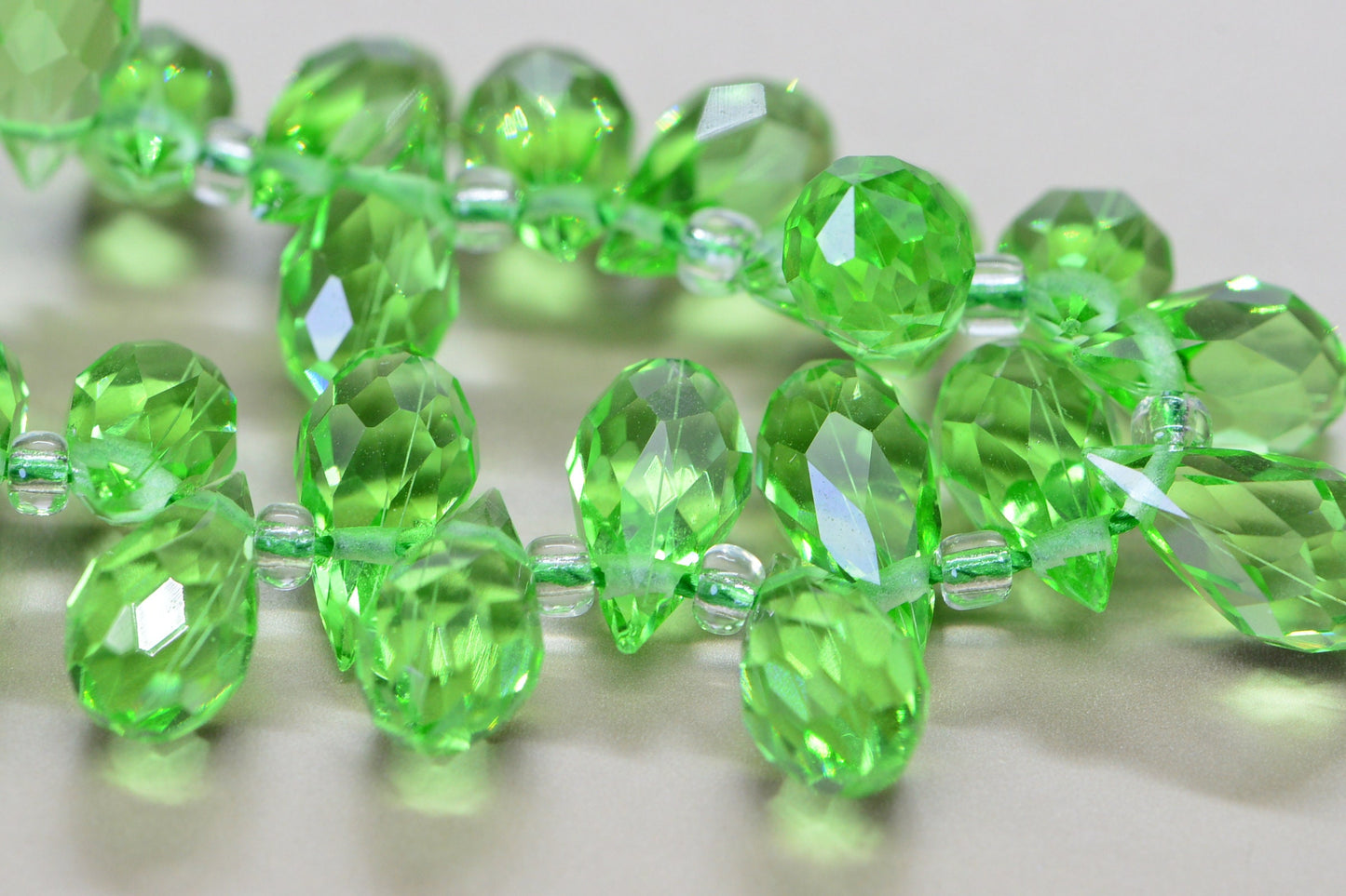 25 Faceted Crystal Glass Briolette Beads - Peridot Green (11.5X 6 mm)