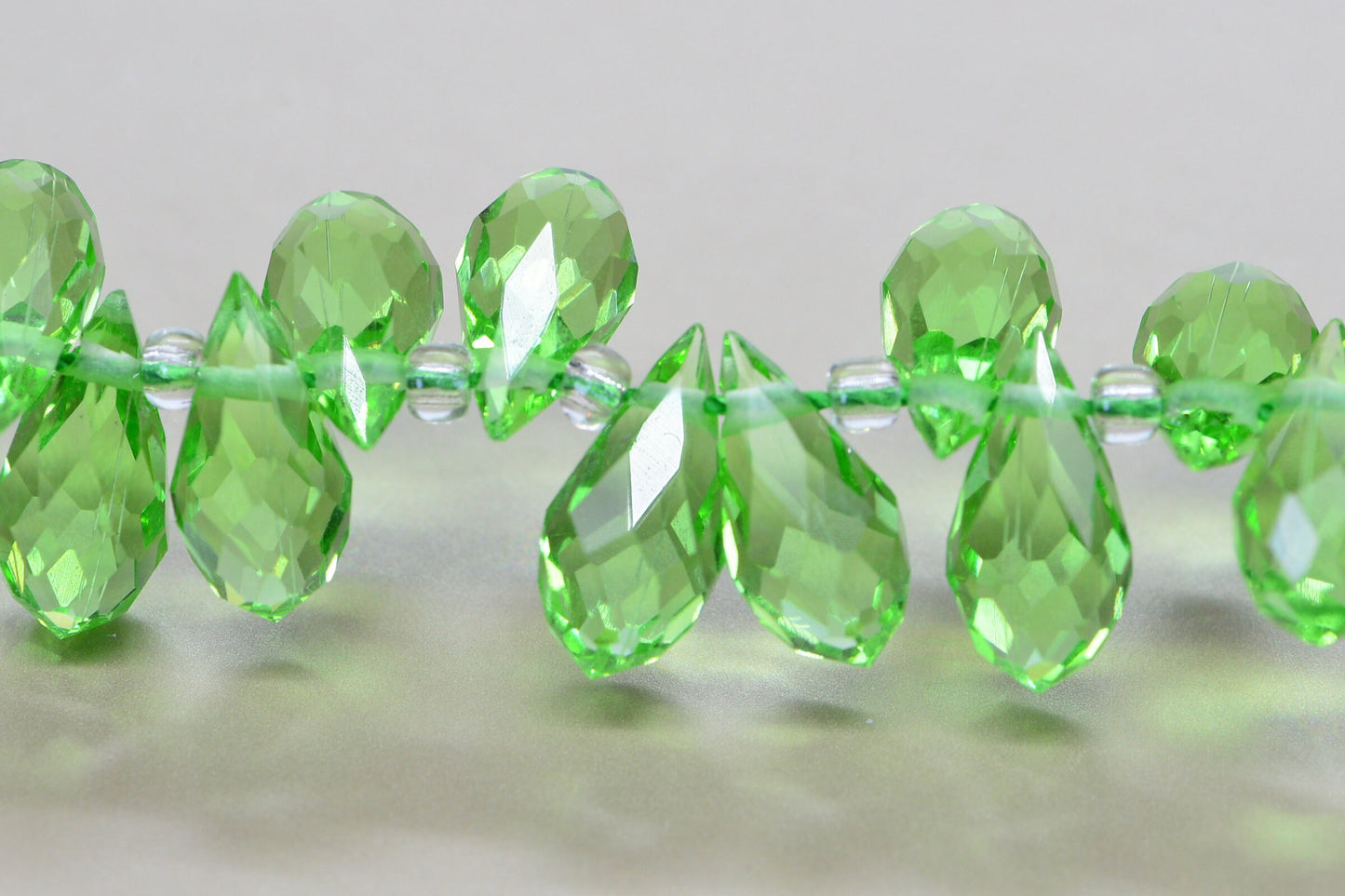 25 Faceted Crystal Glass Briolette Beads - Peridot Green (11.5X 6 mm)