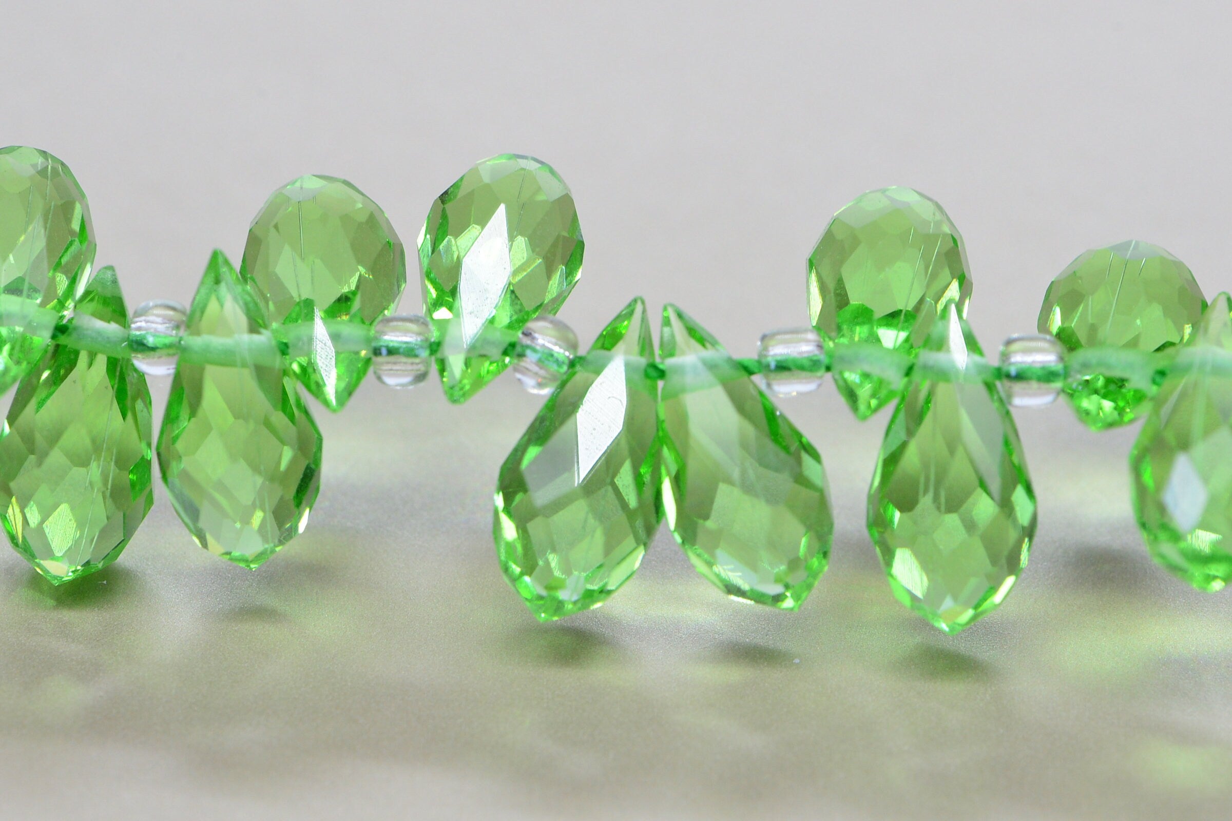 25 Faceted Crystal Glass Briolette Beads - Peridot Green (11.5X 6 mm)