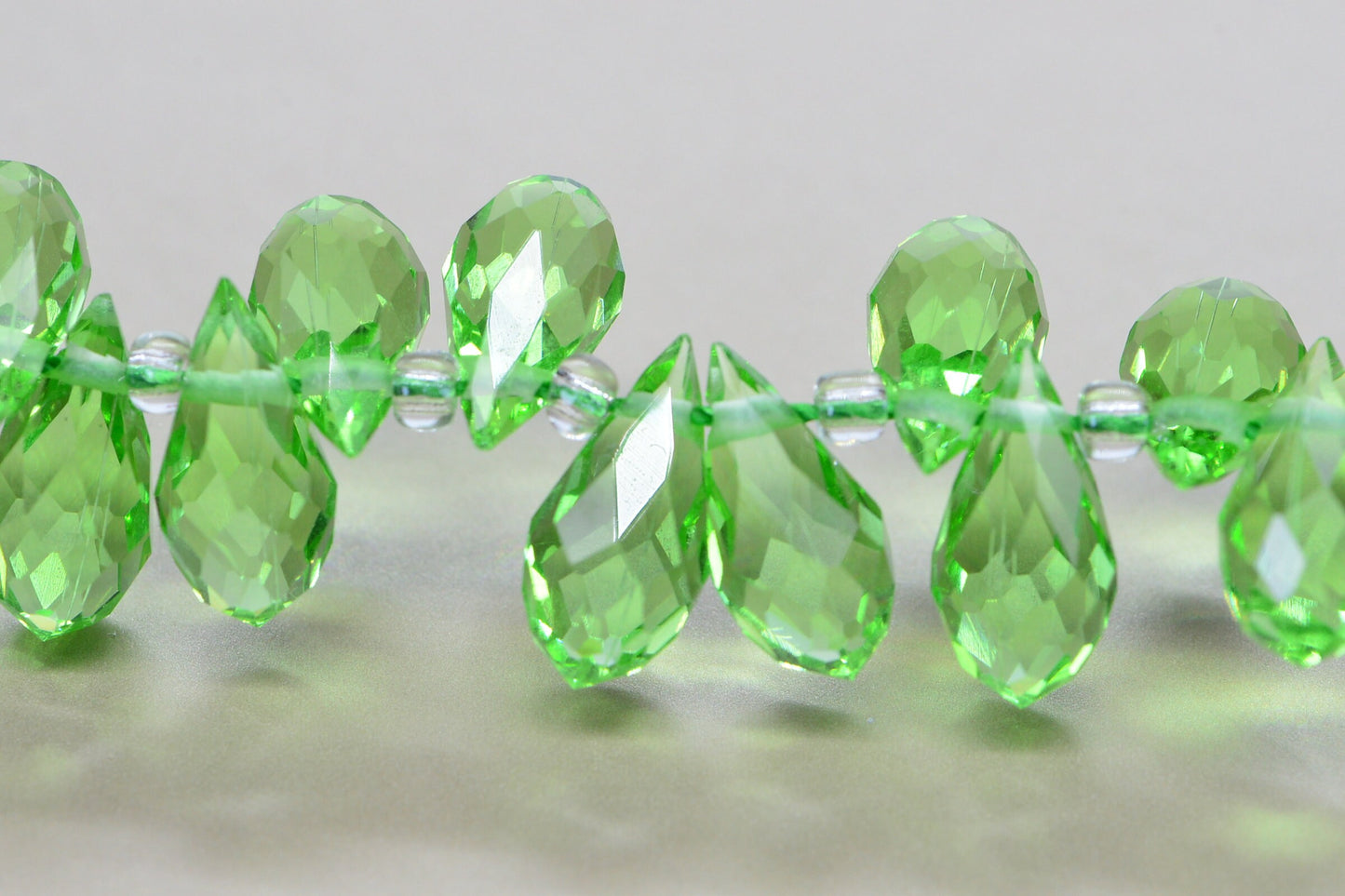 25 Faceted Crystal Glass Briolette Beads - Peridot Green (11.5X 6 mm)