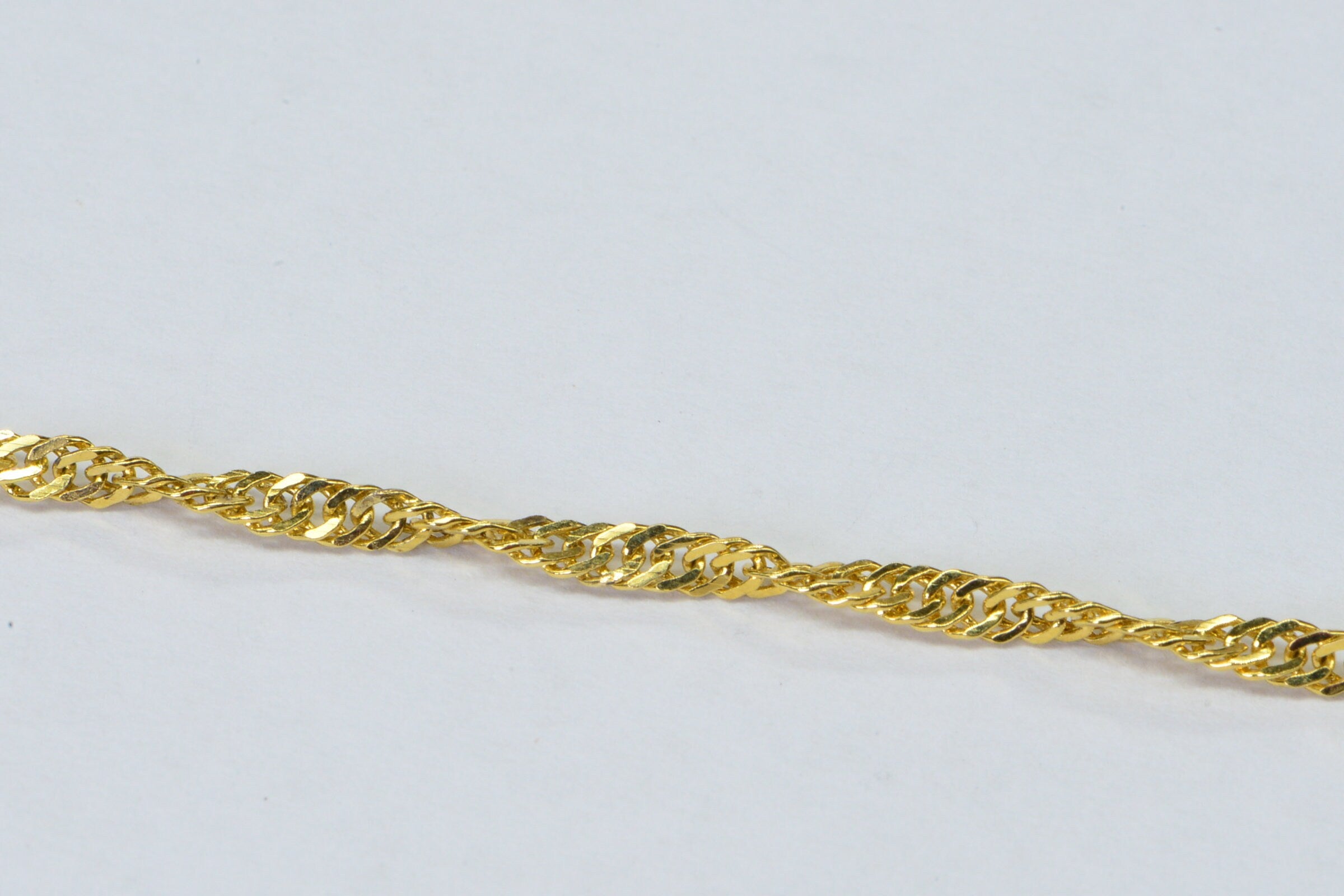 Twisted Herringbone Chain Bracelet: 14K Yellow Gold Over Sterling Silver, 8"