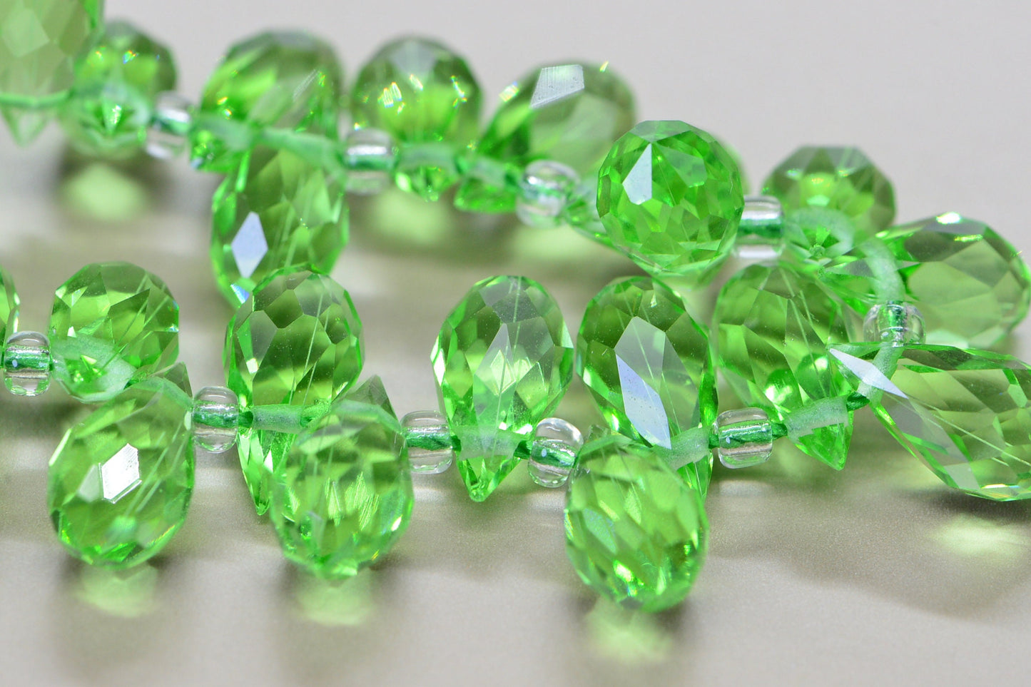 25 Faceted Crystal Glass Briolette Beads - Peridot Green (11.5X 6 mm)