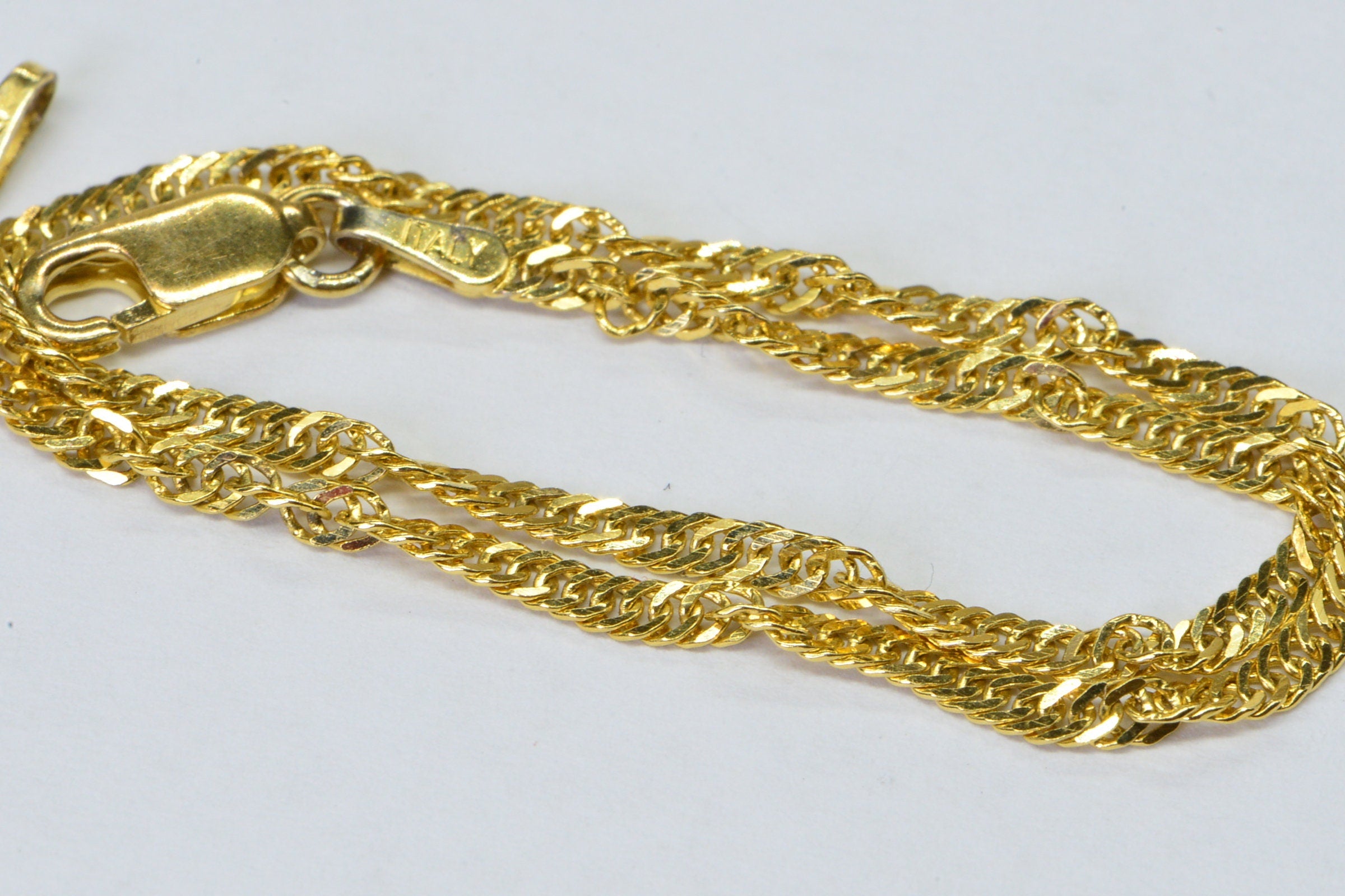 Twisted Herringbone Chain Bracelet: 14K Yellow Gold Over Sterling Silver, 8"