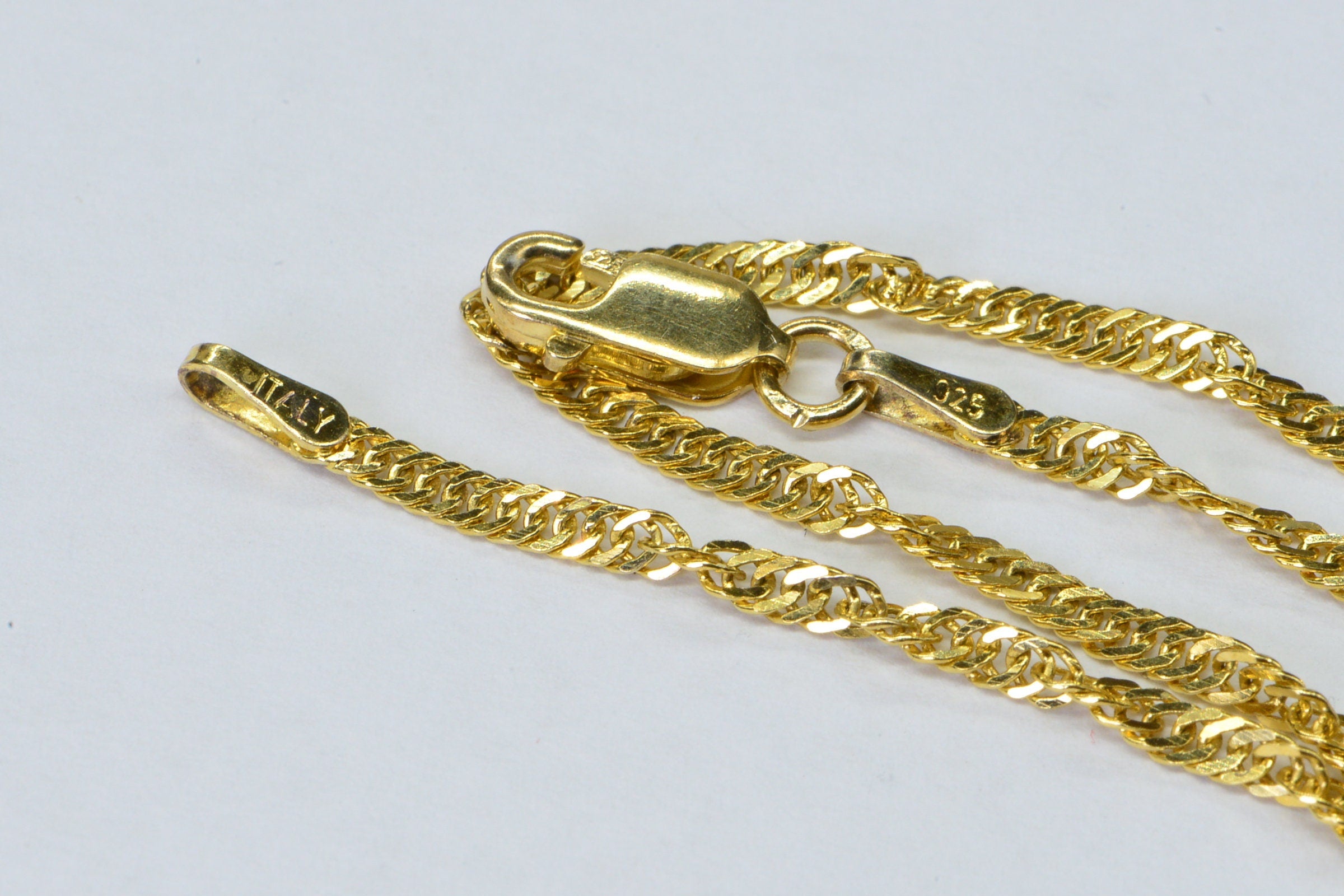 Twisted Herringbone Chain Bracelet: 14K Yellow Gold Over Sterling Silver, 8"