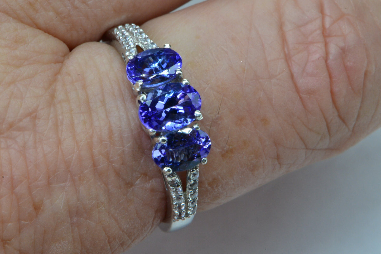 Tanzanite Three Stone Ring: Diamond Accent, 14K White Gold Over Sterling Silver
