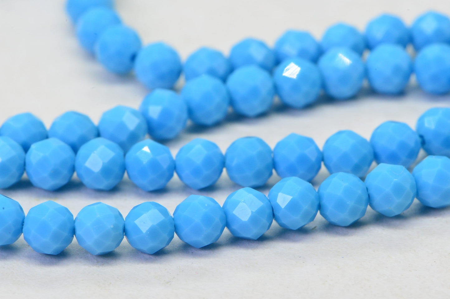 Sleeping Beauty Turquoise Beads: 4mm Round Faceted Sky Blue Strand