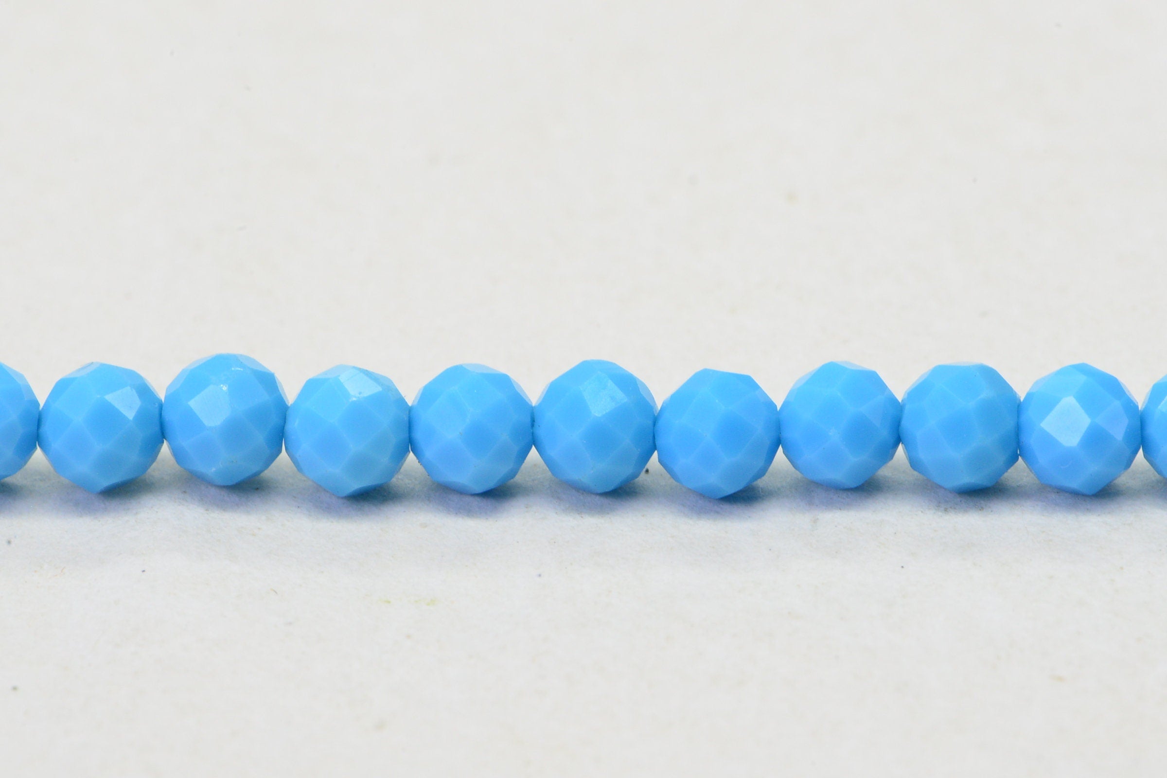 Sleeping Beauty Turquoise Beads: 4mm Round Faceted Sky Blue Strand