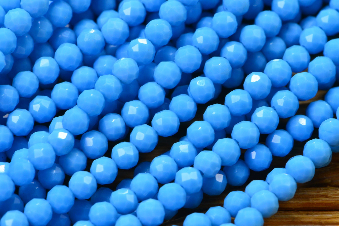 Sleeping Beauty Turquoise Beads: 4mm Round Faceted Sky Blue Strand