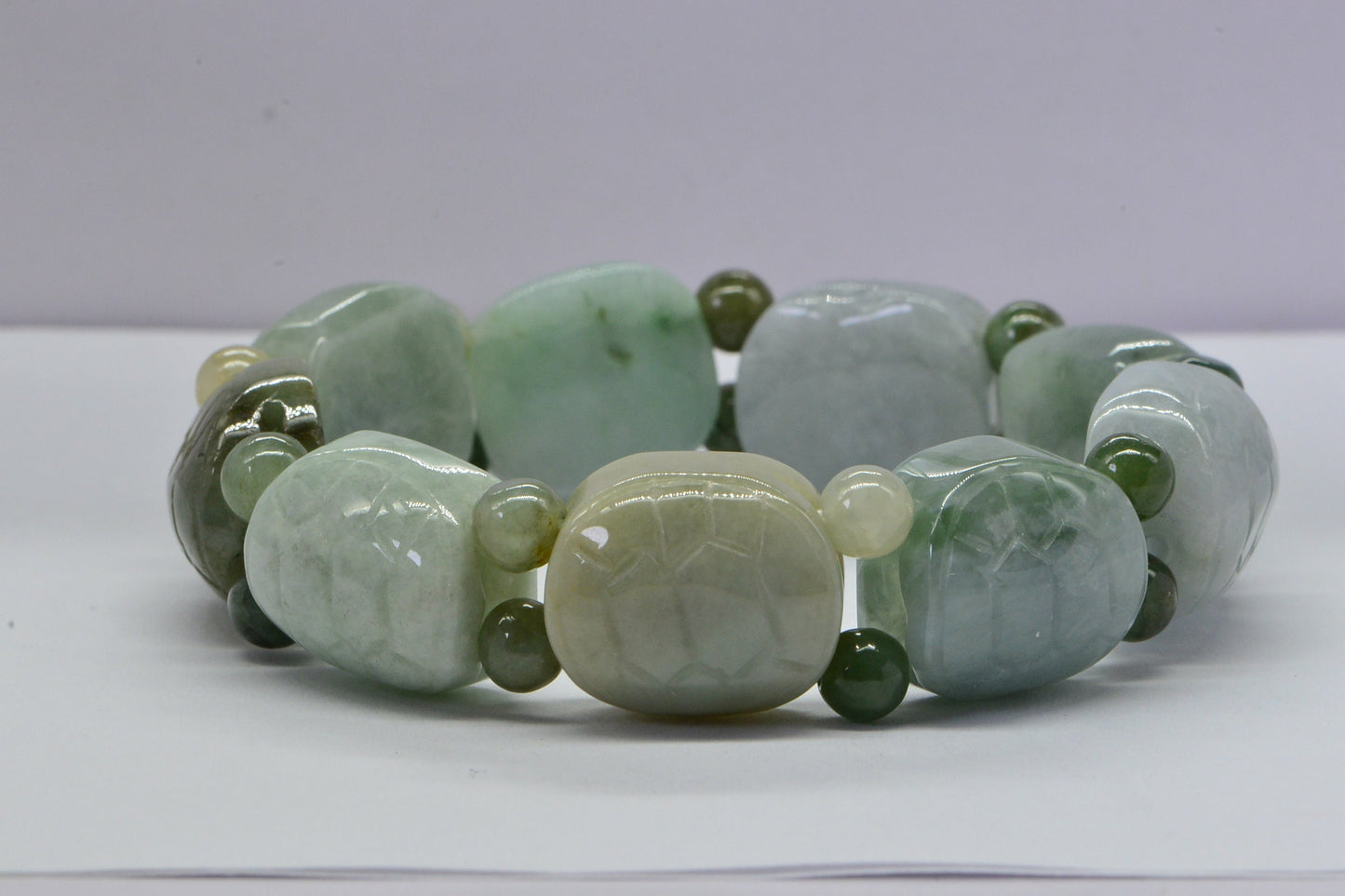 Burmese Jadeite Turtle Bracelet: Icy Green Carved Jade Beads
