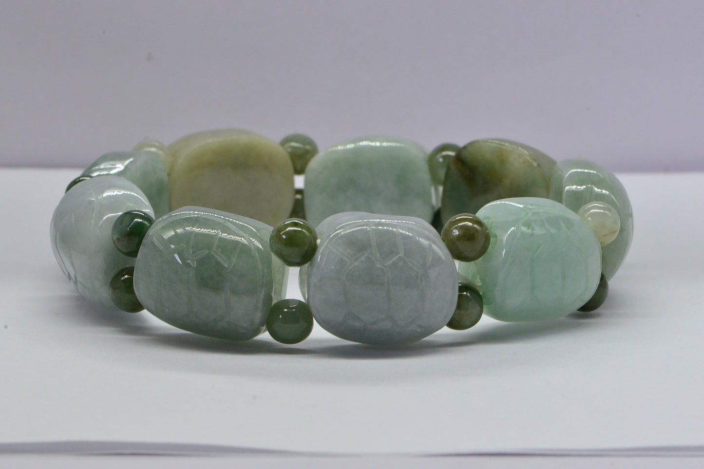 Burmese Jadeite Turtle Bracelet: Icy Green Carved Jade Beads