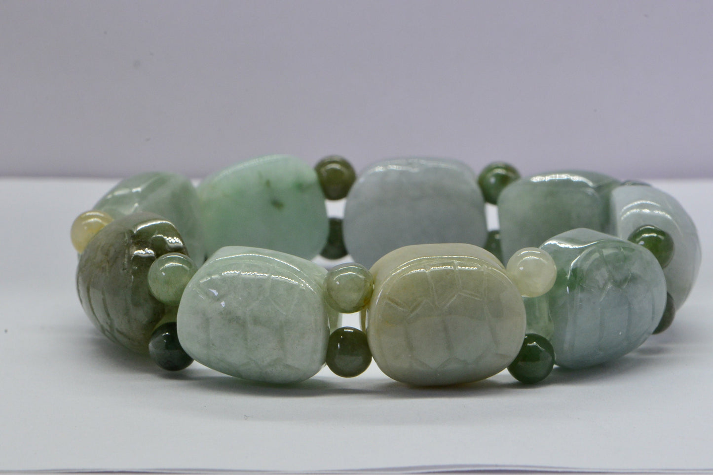 Burmese Jadeite Turtle Bracelet: Icy Green Carved Jade Beads