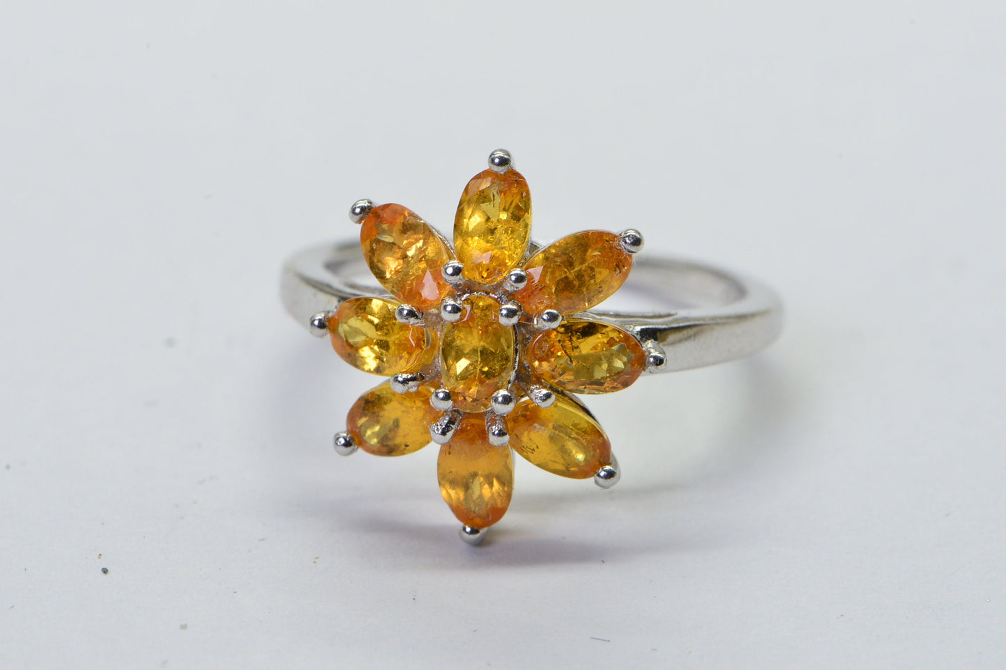 Tanzanite Flower Ring: Oval Sterling Silver, Prong Set