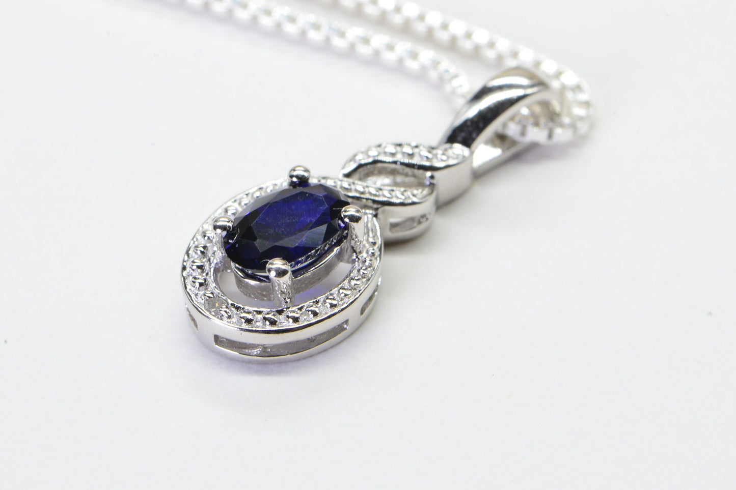 Sapphire Pear Pendant: Diamond Halo, Sterling Silver, September Birthstone