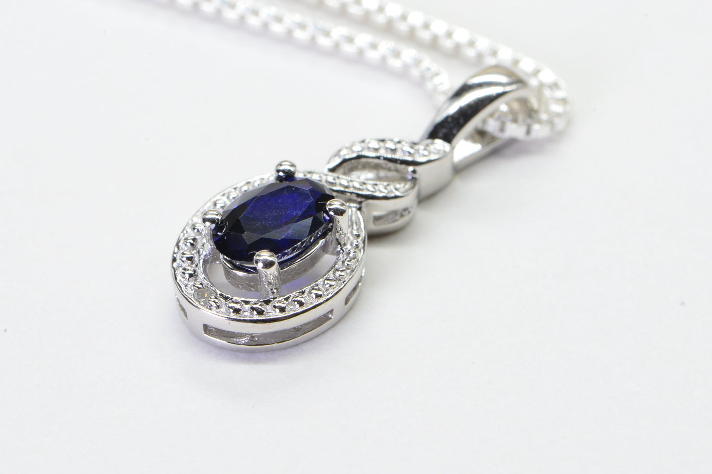 Sapphire Pear Pendant: Diamond Halo, Sterling Silver, September Birthstone