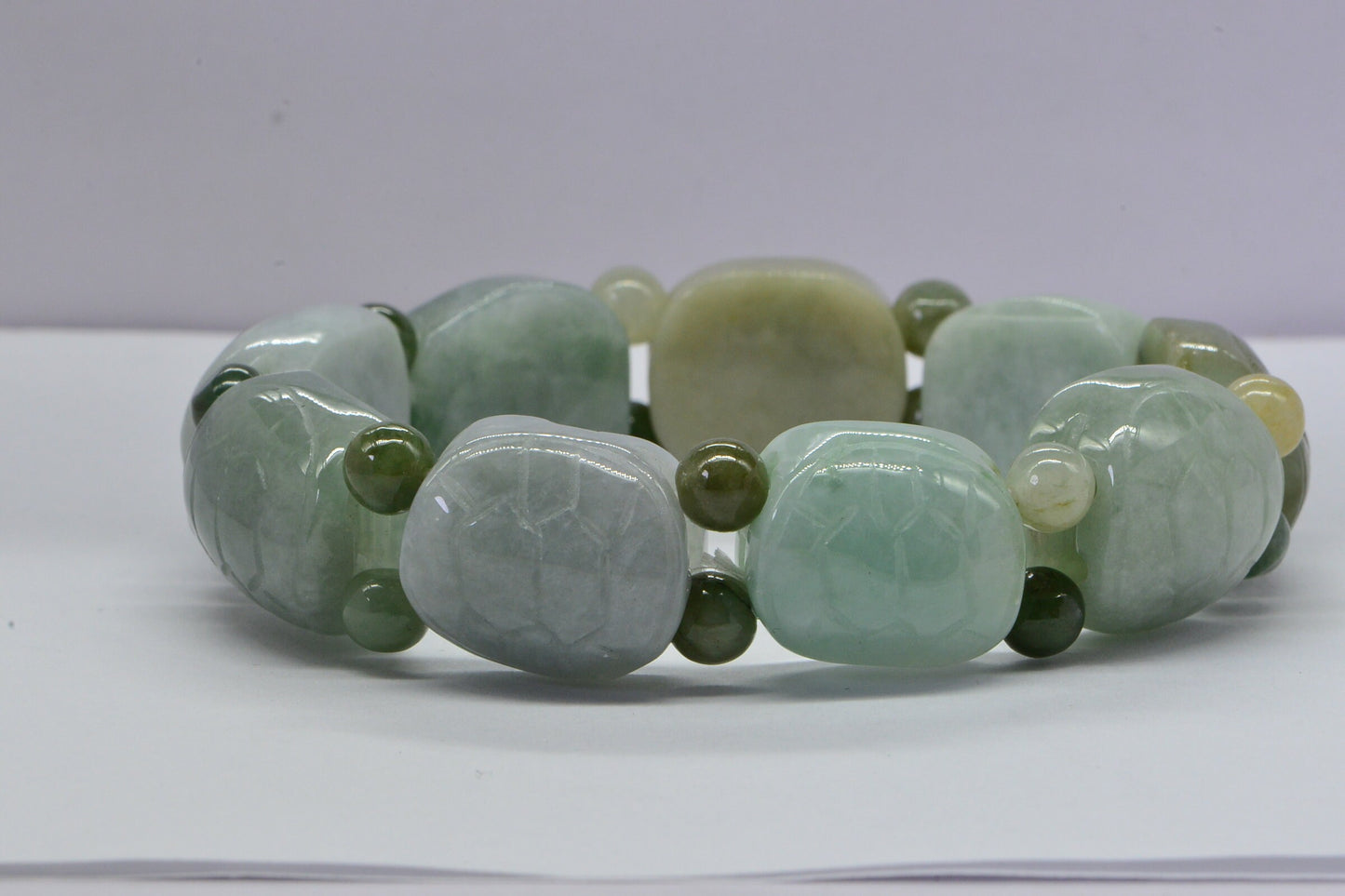 Burmese Jadeite Turtle Bracelet: Icy Green Carved Jade Beads