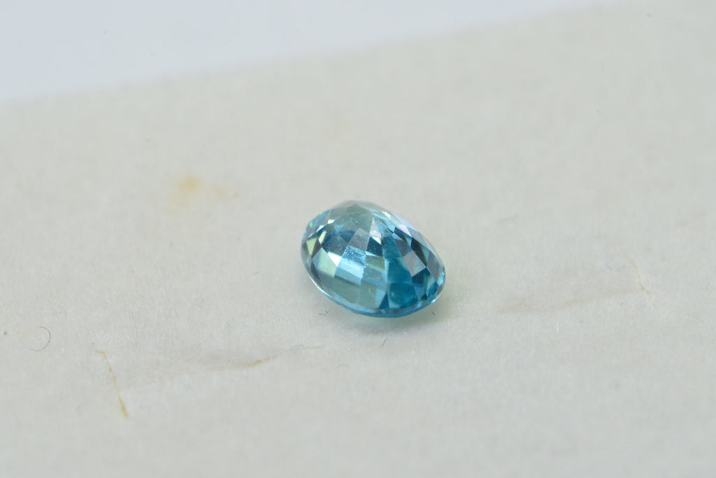 Aqua Blue Topaz: Oval Faceted Cabochon, November Birthstone