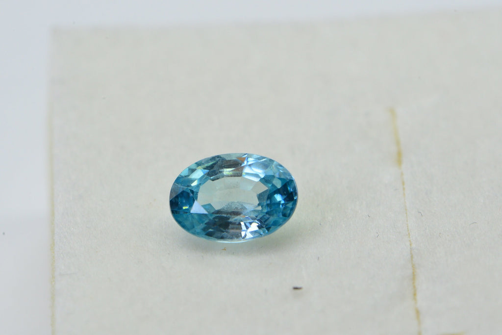 Aqua Blue Topaz: Oval Faceted Cabochon, November Birthstone