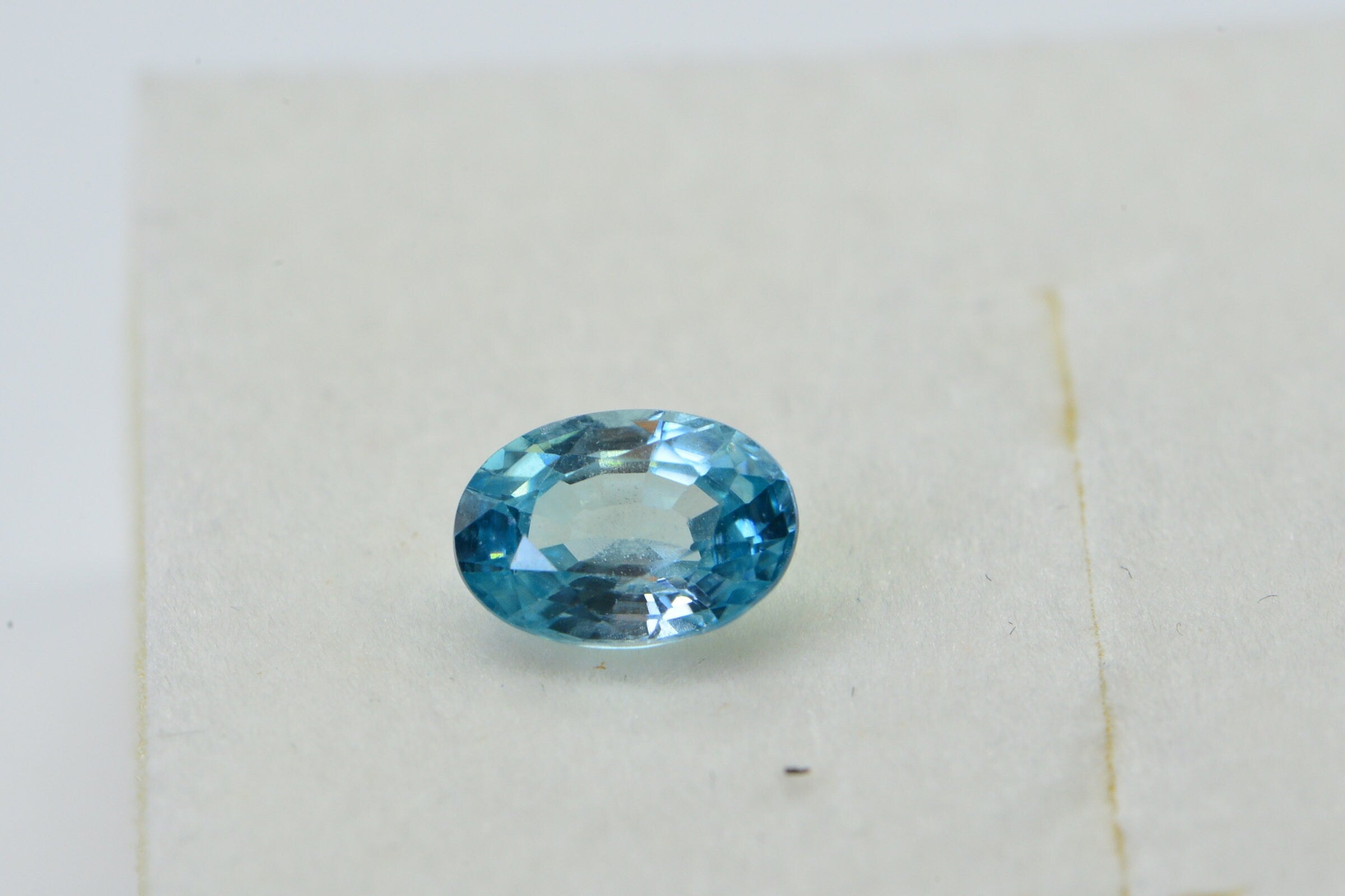 Aqua Blue Topaz: Oval Faceted Cabochon, November Birthstone